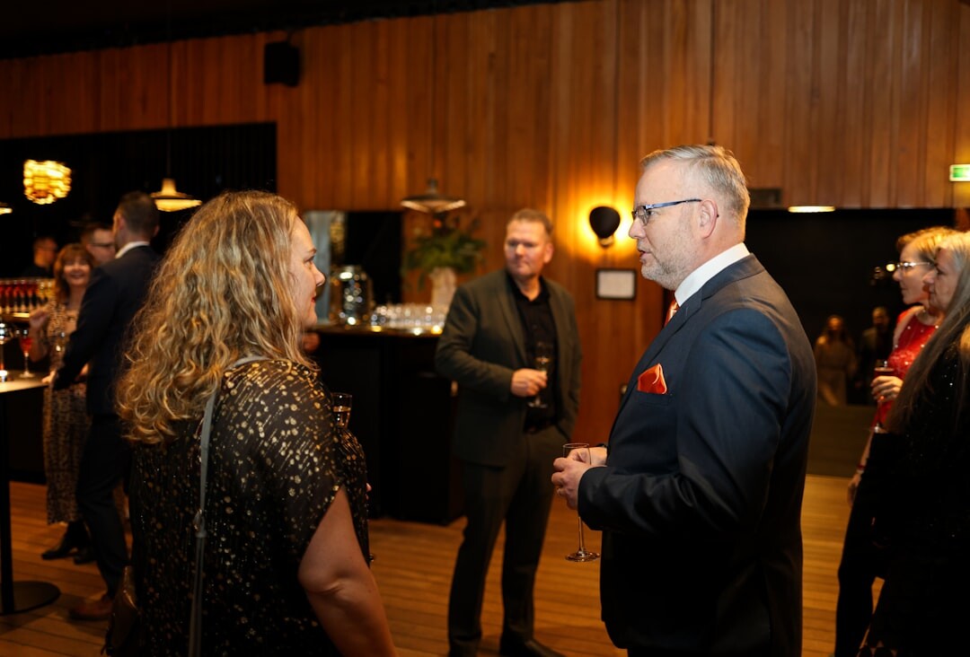 media professionals networking at event